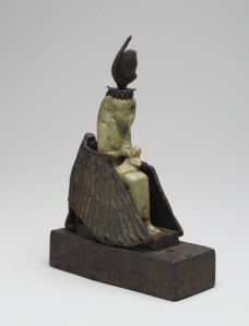 An unusual statue of Isis nursing Horus, but instead of Her wings protecting Osiris or Horus, Isis Herself is protected by the wings of Mut, the Mother Goddess in the form of a vulture. This is from Saqqara.