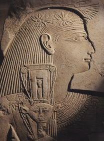 A priestess with the naos style of sistrum