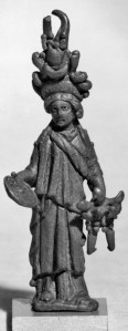 A small Roman statuette of Isis Fortuna; She's looking a bit burdened under that headdress of abundance. She also carries the Wheel of Fate and, I think, a cornucopia.