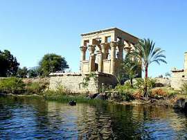 The lovely Philae kiosk of the Roman Emperor Trajan in which the emperor is shown making offering to Isis and Osiris