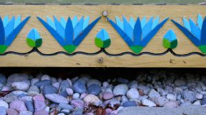 The temple is decorated with glass lotuses, each cut by hand and cemented in place.