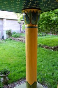 A single lotus pillar; that purple bit you see behind it, is the grape arbor of Dionysos