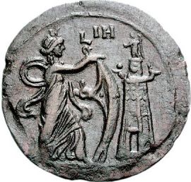 Isis Pharia with Her sail and the lighthouse on the right