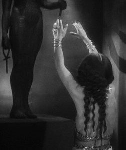 "Come to me, my Tana." Wait! Could it be tana leaves?!? Sorry. I have a soft spot for this movie. Here, Ankhesenamun invokes Isis for aid.