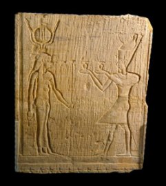 The pharaoh, as High Priest, makes offering to Isis