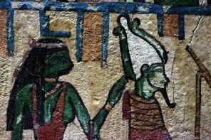 Green Isis working Her healing and protective magic on Osiris; from a stele now in the Louvre; photo by Rama; wikicommons 