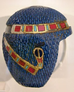 Ah look! A lapis lazuli head; 19th dynasty. This is supposed to be a wig, but not sure you could wear this...looks more like a wig for a statue