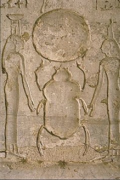 Isis and Nephthys support Khepri in the solar rebirth