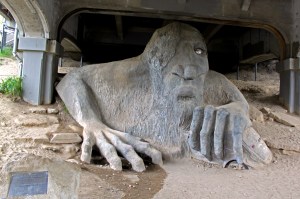 The Seattle Troll; that's a real VW Beetle in his left hand and a real bridge over his head